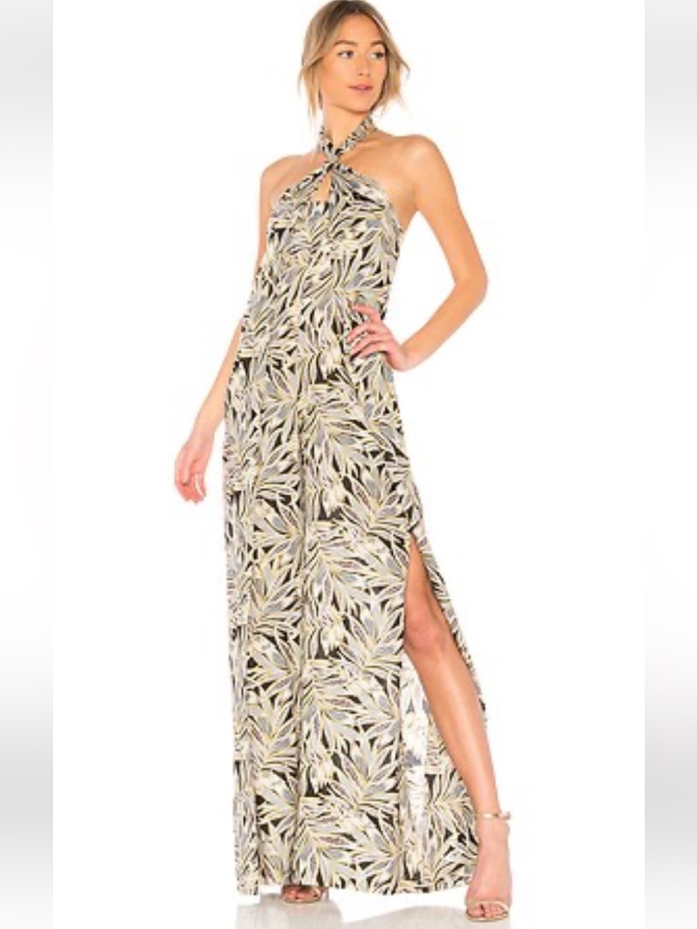 Alexis Gabrielle Jumpsuit featuring a tropical leaf motif and a halter neckline